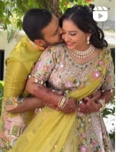 Couple on beach during sunset